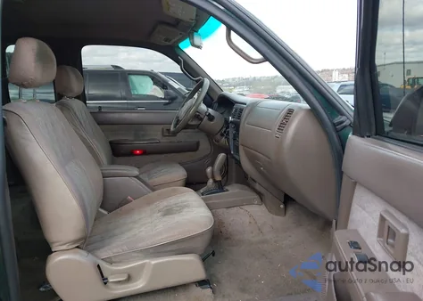 1999 Toyota Tacoma from USA, damaged, VIN 4TAWM72N8XZ547454